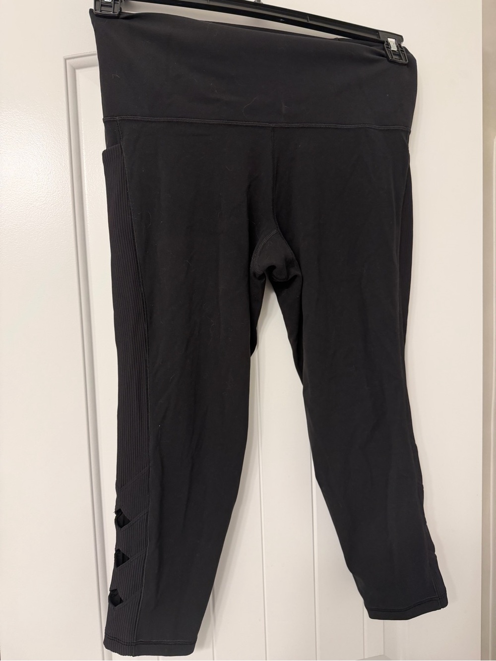 Athleta Salutation Black Leggings with Ribbed Side Panels and Cutout Accents